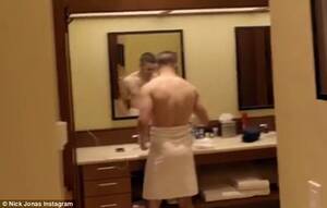 Nick Jonas Nude Porn - Nick Jonas shows off his abs during an episode of Last Year Was Complicated  | Daily Mail Online