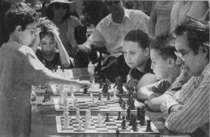 black cocks tiny teens anal - carauna simul Bryant Park, NY 2002.jpg