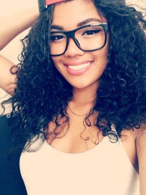 Curly Glasses Porn Ebony - girl with a beautiful smile, curly hair and spectacles
