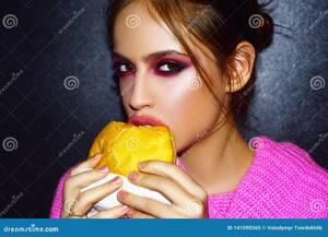 Girl Eating Porn - Woman Eats a Burger, Food. Food Porn. Teen Girls Enjoying Delicious Burgers  in Cafe Stock Image - Image of gray, bright: 141090565