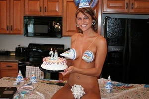 Happy Birthday Sexy Girl - Enjoy the super-sexy nude girl celebrating her birthday in that unusual way  with cake, funny cap and lots of joy!