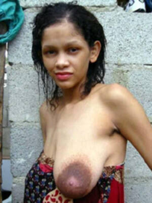 black ebony dark nipples - African ebony whore with huge dark nipples.