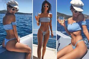 italian topless beach - Emily Ratajkowski shows off her toned tum in a thong bikini as she enjoys a  boat ride in Italy | The Sun