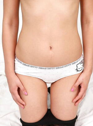 hello kitty upskirt - Very attractive teen Olena in hot panties uncovers tiny tits and toys her  pussy