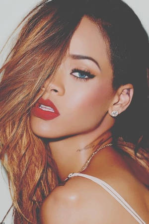 Auburn Hair Female Stars - Rihanna is well-known for her statement red lips. Even if as an everyday  look, its not a fashion 'don't' to have cherry red lips!