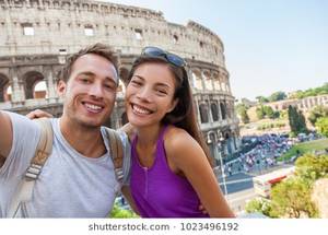 Danish Youngest Vintage Porn - Travel selfie couple taking photo with phone at colosseum famous landmark  in Rome city. Europe