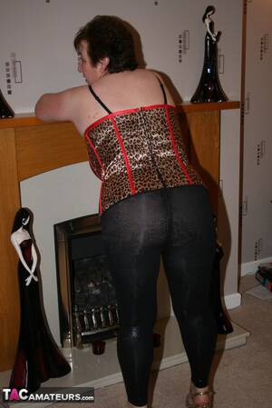 Grannies In Leggings Porn - Chubby granny takes off her red blouse and displays her big body before she  takes off