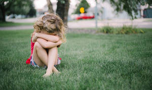 Bribery Porn Captions - Young girl looking upset