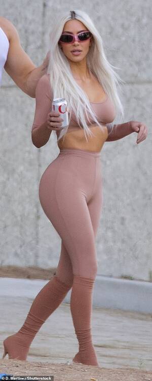 Kim Kardashian See Through Porn - Kim Kardashian bares it all in sheer, nude SKIMS as Pete Davidson supports  her at photoshoot | Daily Mail Online