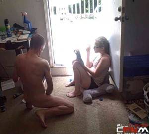 in front of roommate - Tattooed guy jerks off to porn next to clothed female roommate reading a  book2 ...
