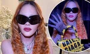 Lindsay Lohan Pussy - Madonna, 64, poses TOPLESS while biting a $3K Balenciaga purse in her  bathroom | Daily Mail Online