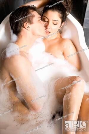Boy And Girl Kissing Porn Bathtub - Couple kissing in bathtub, Stock Photo, Picture And Rights Managed Image.  Pic. XXA-18911AP093 | agefotostock
