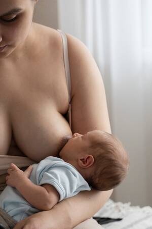 bebe milky tits lactating - Nude Breastfeeding Images - Free Download on Freepik