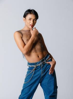 asian slim nude - Premium Photo | Portrait isolated cutout studio shot asian young sexy slim  fashionable lgbtq gay male model in nude naked see through open chest torso  net shirt tear denim jeans standing posing on white background