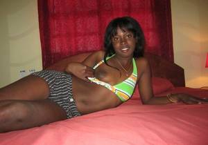 black girls stripping - SexyLiani is tugging her bra aside for a revealing look.