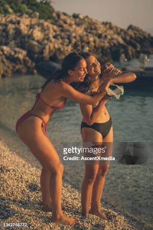 nn beach girls voyeur - 2,915 Young Teen Girls In Swimsuits Stock Photos, High-Res Pictures, and  Images - Getty Images