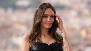 Angelina Jolie Xxx - Angelina Jolie Wears Strapless Little Black Dress at 'Eternals' Photo Call  in Rome