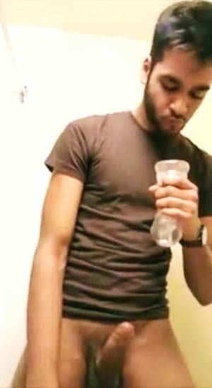 Indian Gay Twink - Indian gay video of a horny and wild twink masturbating his big dick using  a fleshjack and cumming hard