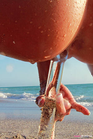 beach girls dildo - Lustful naked girl Layla jerks off with a transparent dildo on the beach -  Porn Pics â€¢ Pixxxle