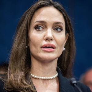 Facial Porn Angelina Jolie - Did Angelina Jolie Get Plastic Surgery? Transformation Photos, Quotes |  Life & Style