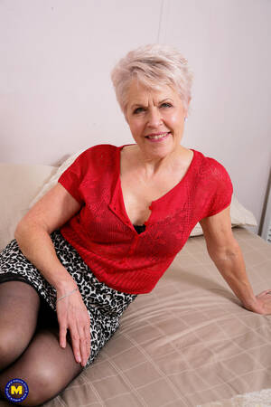 black mature granny masterbating - Horny mature granny wears black stockings to masturbate her shaved pussy -  HD Porn Pictures