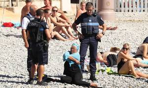 european beach fucking - French police make woman remove clothing on Nice beach following burkini  ban | France | The Guardian