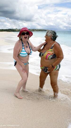 hot fat granny at beach - Hot Granny In Rainbow Colored Bikini Pose Her Fat Body On The Beach With  Another Mature Hottie In Blue And White Stripe Bikini Before They Pull Down  Their Bras And Expose Their