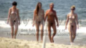 hairy nudist beach group - Nude family on the beach with dad's small hairy cock and young girls with  big hairy pussies and saggy tits