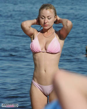 blue beach bikini vagina - Wet sexy beach voyeur pic of hot cameltoe in pink bikini