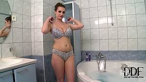 bath busty - Busty brunette takes off her bra and panties to take a bath