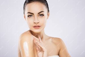 beautiful light ebony girls nude - Premium Photo | Pretty girl with black fixed hair behind, dark big eyes,  soft skin and naked shoulders using cream, a model with light nude make-up,  portrait, beauty photo.