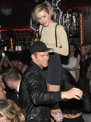 Miley Cyrus Lesbian - Miley Cyrus caught on video in girl-on-girl smooch with Britney Spears'  dancer | Daily Mail Online