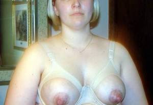 homemade porn bra - Wife's tits out of nursing bra.