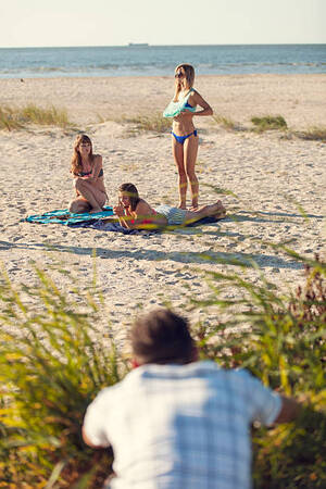 clothing free beach voyeur - 30+ Man Peeping At Women On Beach Stock Photos, Pictures & Royalty-Free  Images - iStock