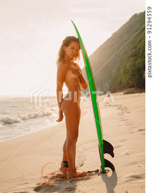 beach girls naked on webcam - Naked attractive surf girl standing with... - Stock Photo [91294359] - PIXTA