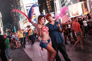 body painted teen girls - A semi-nude model poses for a photo in Times Square on Aug. 19