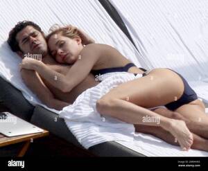 Melissa Theuriau Sex - Exclusive!! Jamel Debbouze and his adoring wife Melissa Theuriau spend a  romantic day by the pool cuddling and kissing. The new parents, who had a  son on 3 December 2008 called Leon,