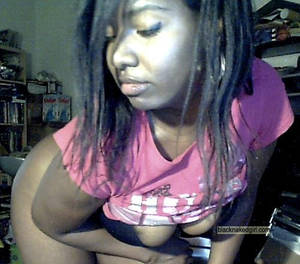 nasty ebony webcam show - Description: Nasty young ebony girl spreading her big black tits on webcam,  camwhoring black teen