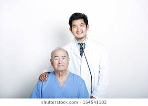 Massage Doctor Schoolgirl - A young Asian Doctor with his hand on the shoulder of a Senior adult patient