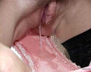 dripping pussy - Sticky wet pink panties filled with pussy juice picture