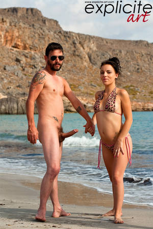 big cock beaches - Nude bearded man in sunglasses gets his cock sucked by two brunettes on the  wild beach