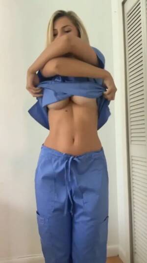 hot nurse striptease - Sexy nurse stripping off her uniform