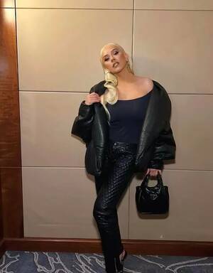 latex christina aguilera porn - Christina Aguilera struggles to contain famous curves in skintight leather  pants - Daily Star