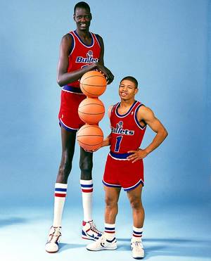 basketball player - Manute Bol, the tallest NBA player with \