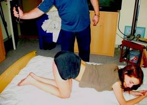 asian spanked belt naked - spanking picture. â€œ